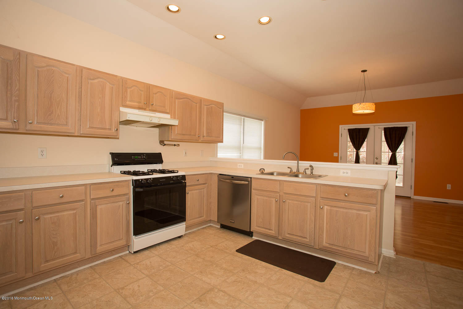 157 Cruise Road Manahawkin, NJ 08050 - Photo 4 of 14 a kitchen with granite countertop a sink stainless steel appliances and cabinets