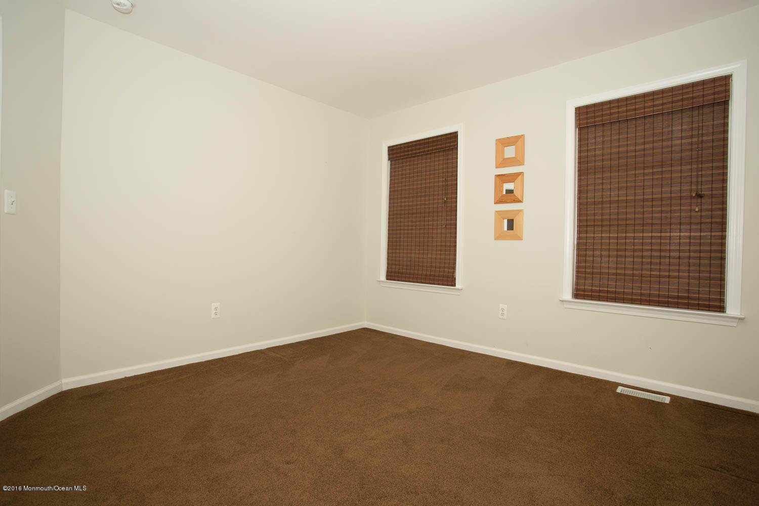157 Cruise Road Manahawkin, NJ 08050 - Photo 7 of 14 an empty room with a window