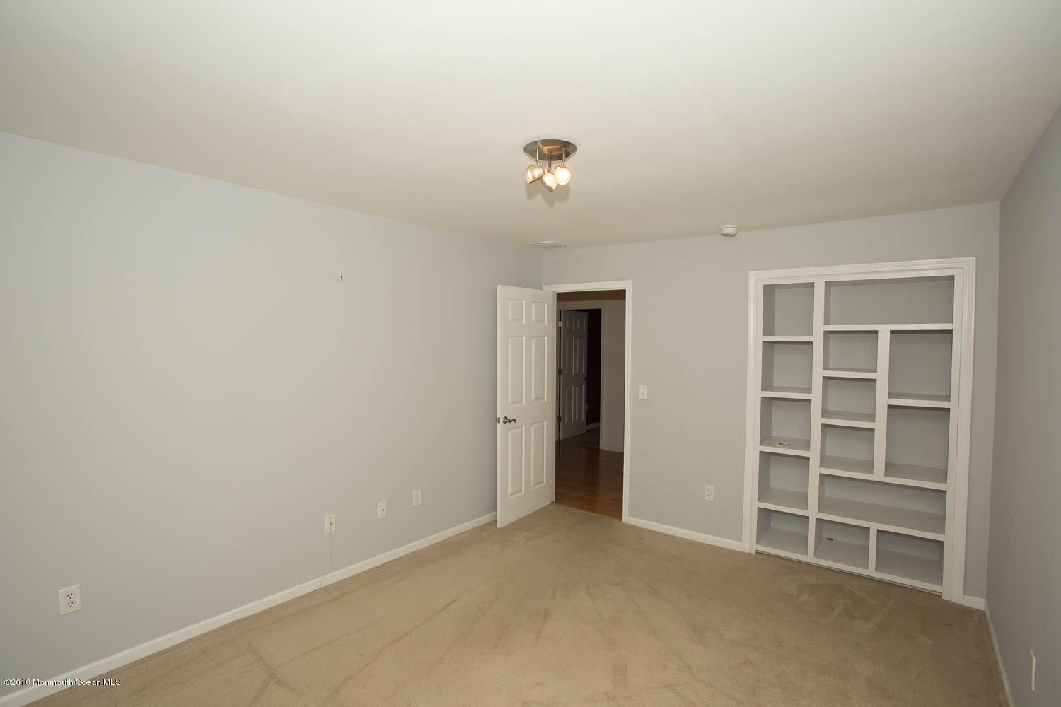 157 Cruise Road Manahawkin, NJ 08050 - Photo 9 of 14 a view of an empty room with a closet