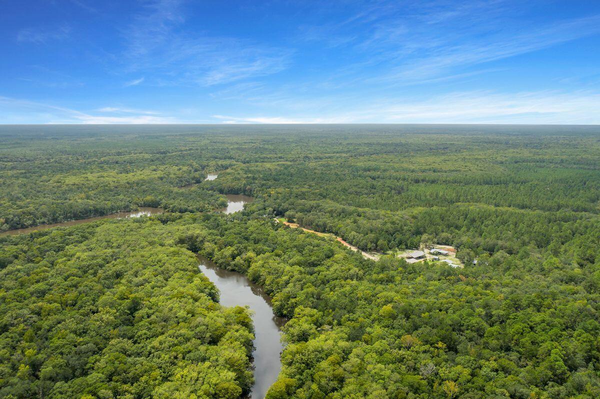 66 Sawmill Road Ponce de Leon, FL 32455 - Photo 11 of 14 a view of a field with an ocean