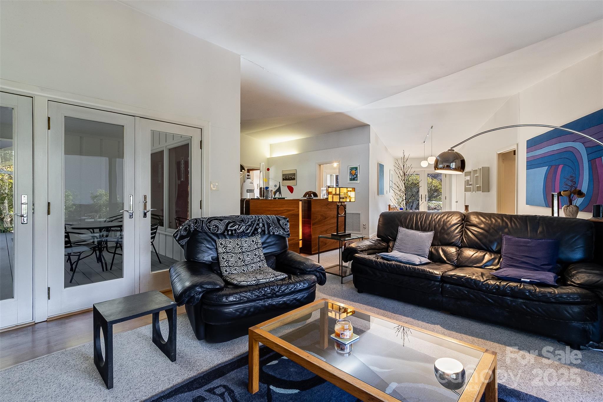 616 Robmont Road Charlotte, NC 28270 - Photo 12 of 38 a living room with furniture and a table