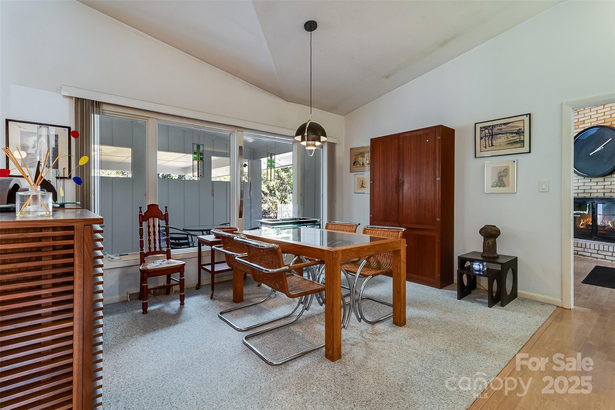 616 Robmont Road Charlotte, NC 28270 - Photo 13 of 38 a room with furniture a chandelier and a window