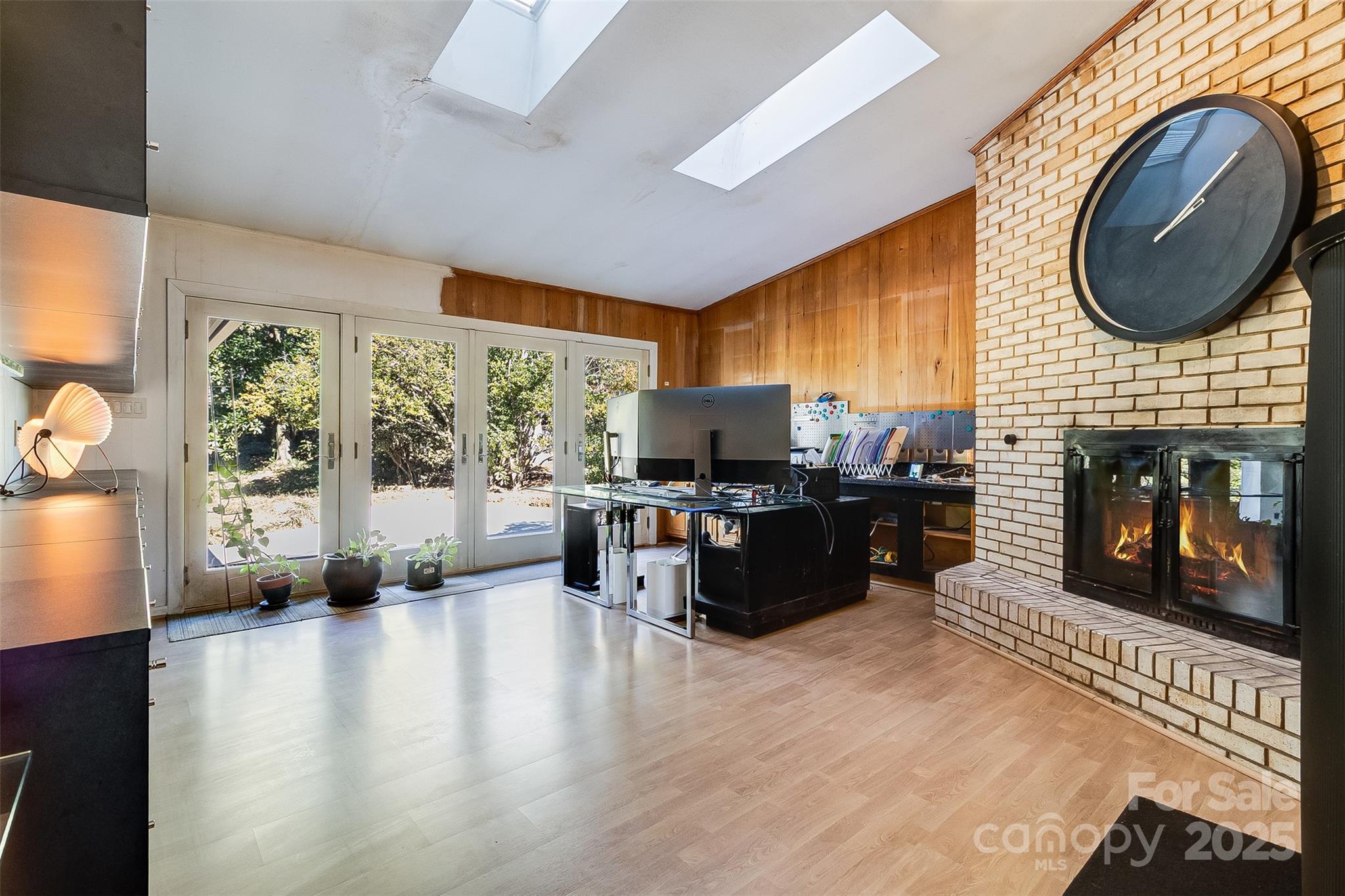 616 Robmont Road Charlotte, NC 28270 - Photo 20 of 38 a living room with furniture and a fireplace