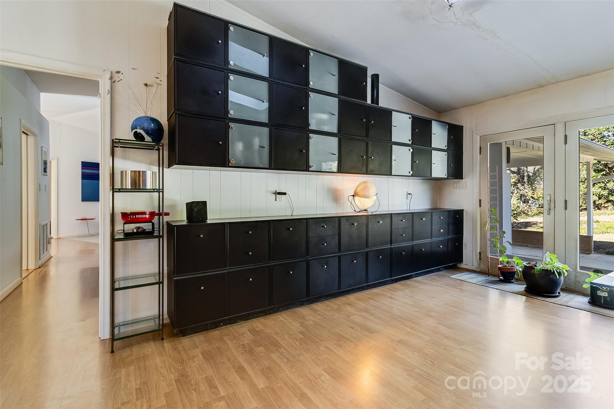 616 Robmont Road Charlotte, NC 28270 - Photo 21 of 38 a bedroom with a bed and a large cabinets