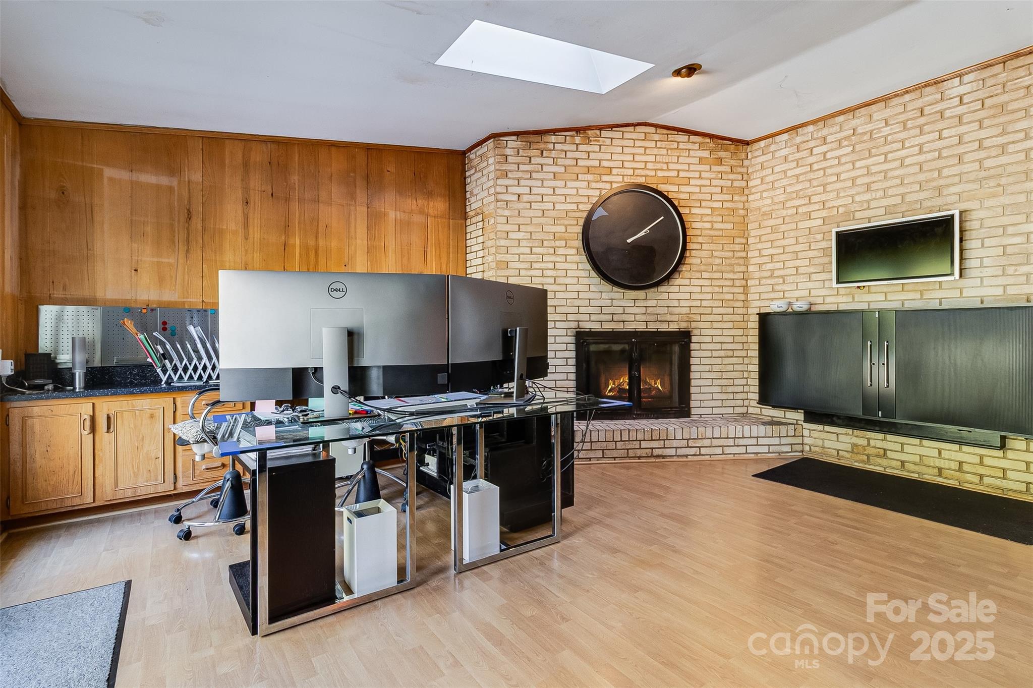616 Robmont Road Charlotte, NC 28270 - Photo 22 of 38 a open kitchen with stainless steel appliances granite countertop a stove top oven a sink dishwasher and a microwave with wooden floor