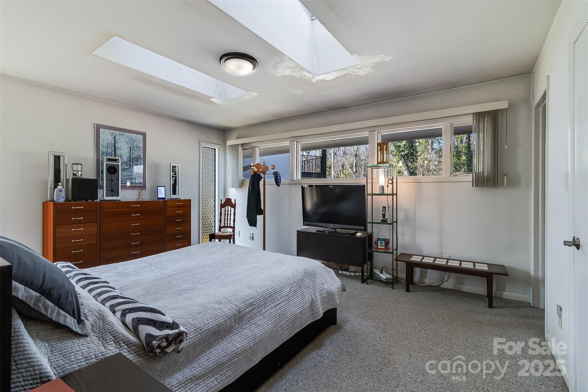 616 Robmont Road Charlotte, NC 28270 - Photo 26 of 38 a bedroom with a bed and furniture