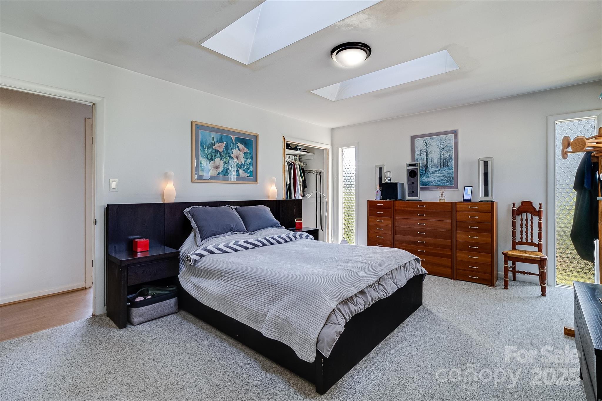 616 Robmont Road Charlotte, NC 28270 - Photo 27 of 38 a bedroom with a bed and dresser