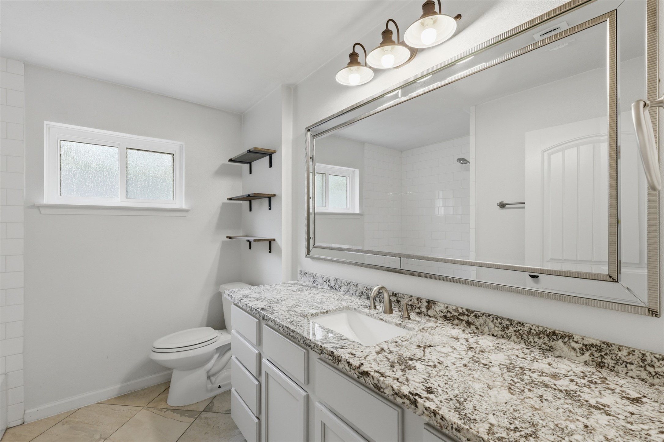 24714 Hunters Hollow Drive Spring, TX 77380 - Photo 28 of 39 2nd full bathroom sits conveniently between the two secondary bedrooms