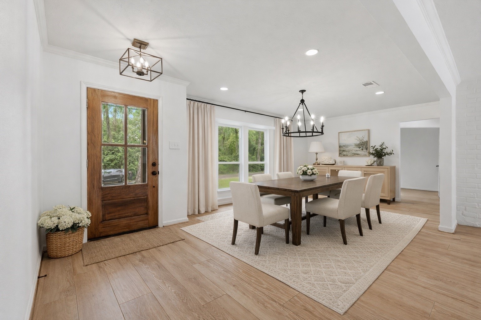 24714 Hunters Hollow Drive Spring, TX 77380 - Photo 7 of 39 This spacious dining area at the entrance is perfect for hosting memorable gatherings.