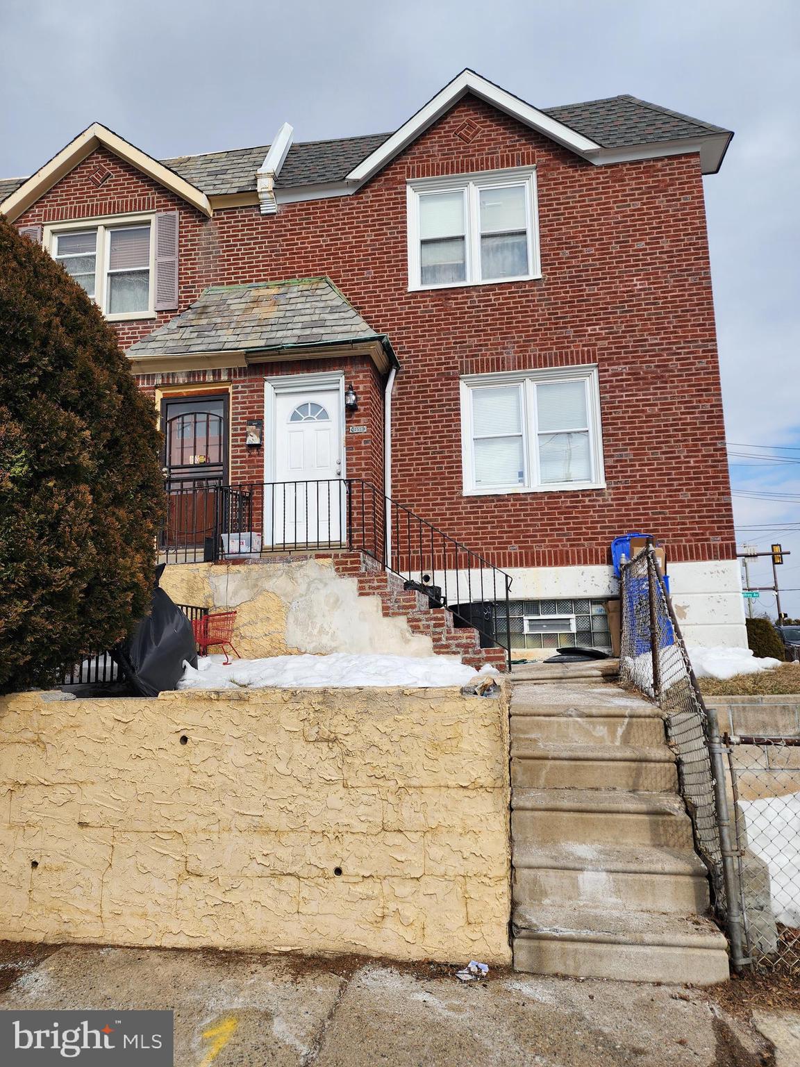 89 Sparks Street Philadelphia, PA 19120 - Photo 1 of 37 a front view of a house with a yard