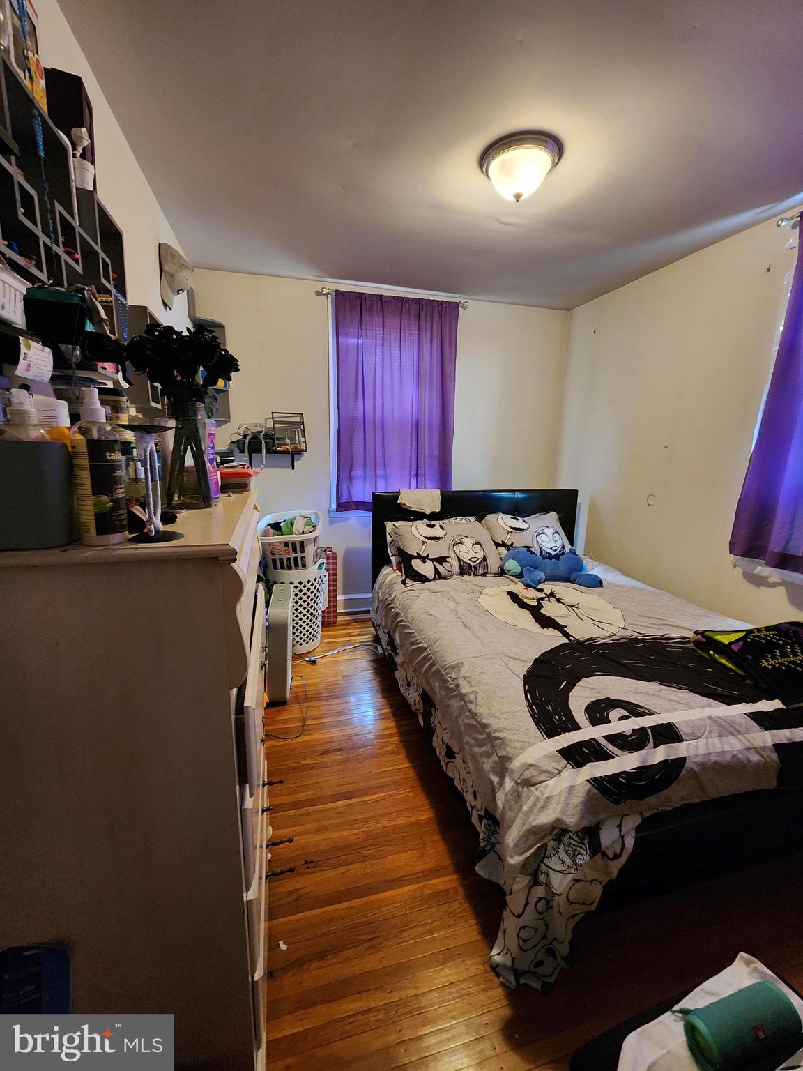 89 Sparks Street Philadelphia, PA 19120 - Photo 11 of 37 a bed room with a bed and a window