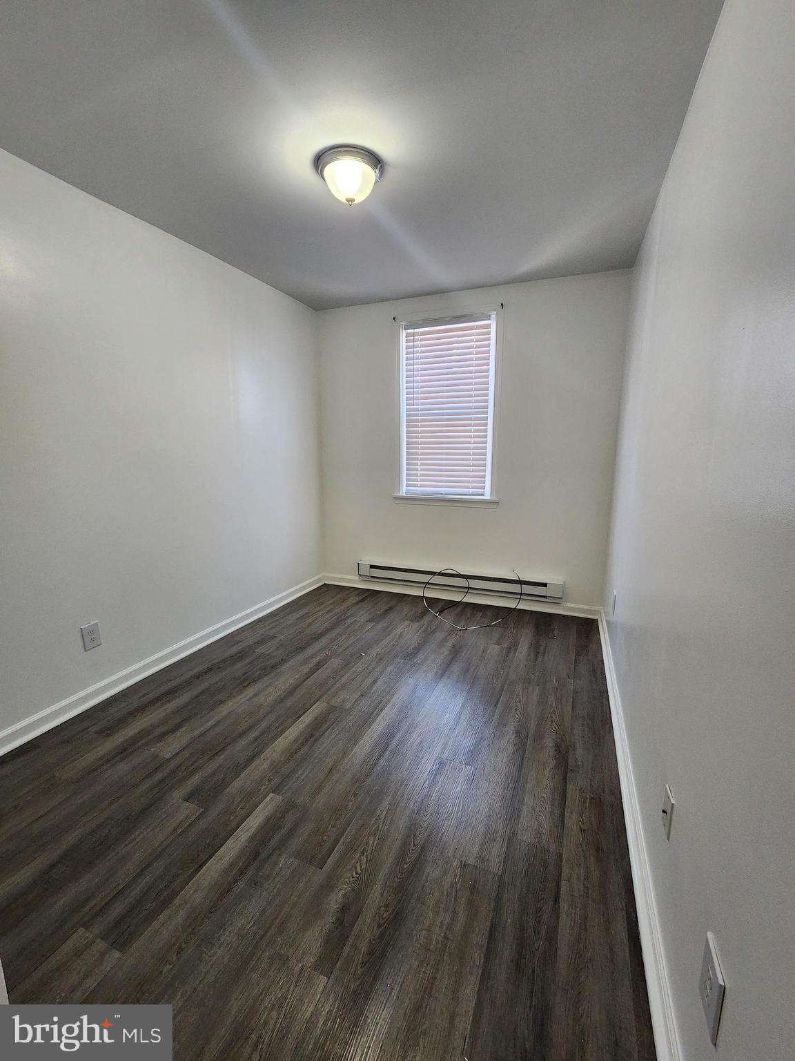 89 Sparks Street Philadelphia, PA 19120 - Photo 19 of 37 a view of a room with wooden floor