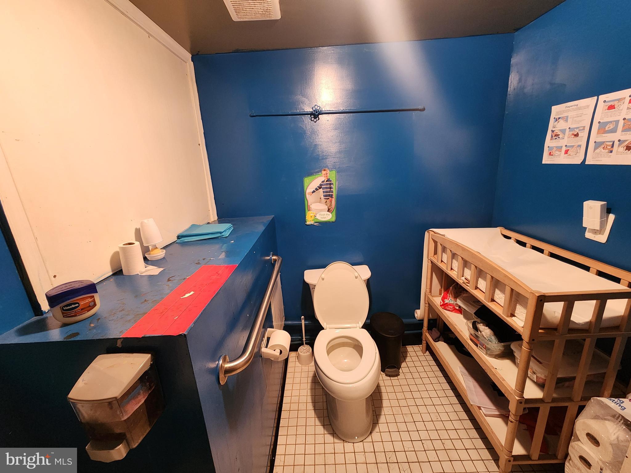 89 Sparks Street Philadelphia, PA 19120 - Photo 31 of 37 a bathroom with a toilet and a sink
