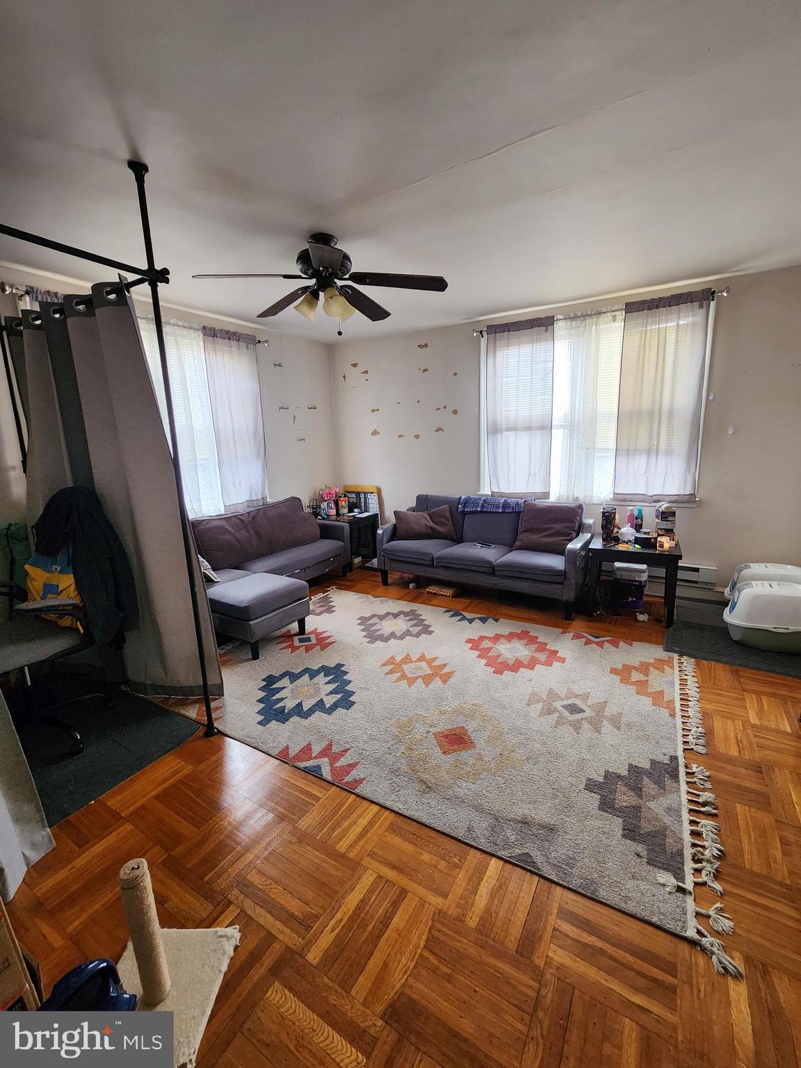 89 Sparks Street Philadelphia, PA 19120 - Photo 5 of 37 a living room with furniture and a window