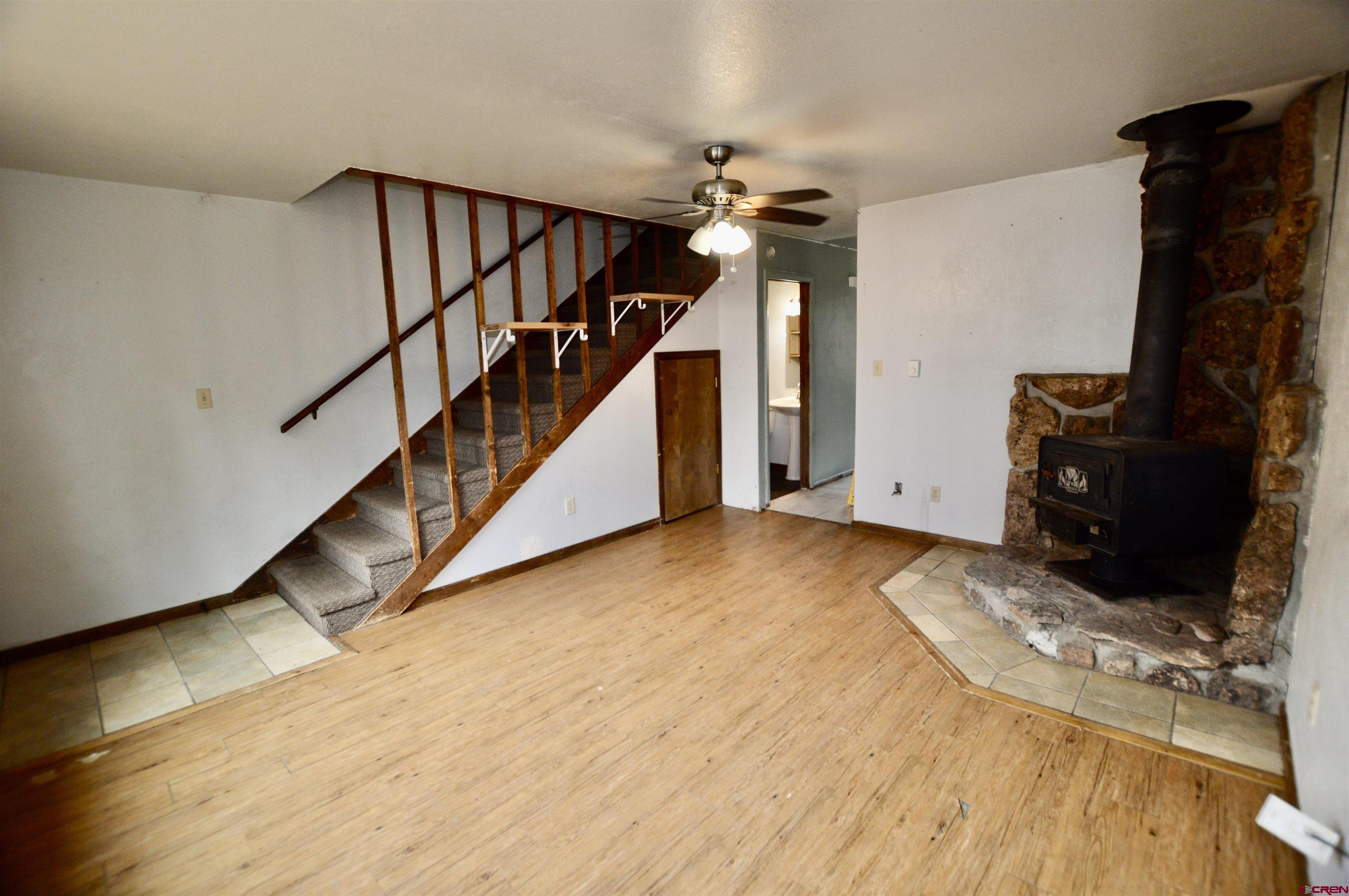 1005 West Denver Avenue, Unit G4 Gunnison, CO 81230 - Photo 11 of 21 a view of entryway and hall with wooden floor