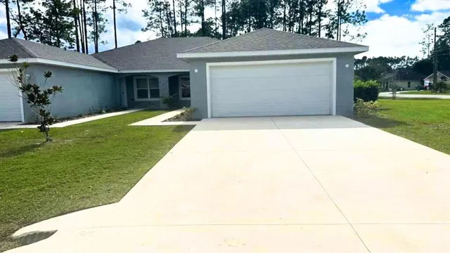 a view of outdoor space yard and garage