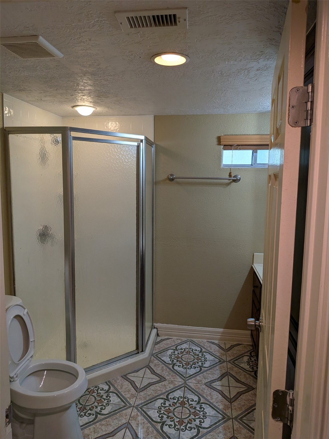 807 Ruth Street Baytown, TX 77520 - Photo 14 of 36 a bathroom with a shower and a toilet
