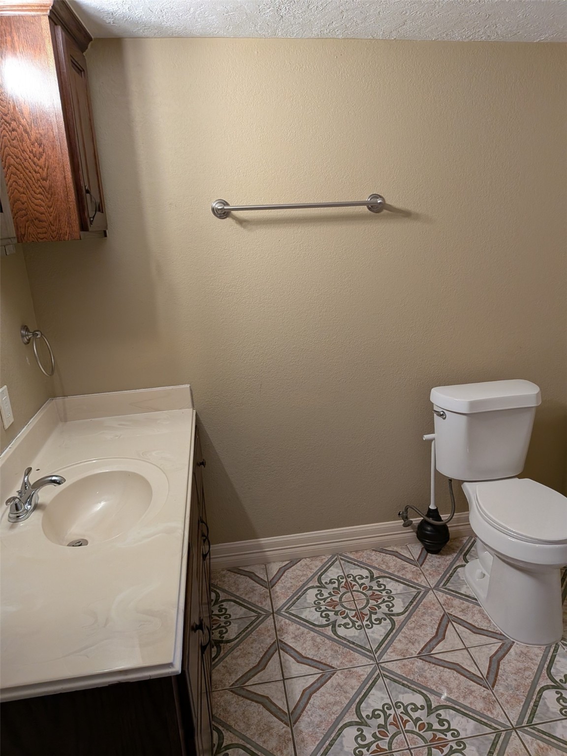 807 Ruth Street Baytown, TX 77520 - Photo 17 of 36 a bathroom with a sink and a toilet