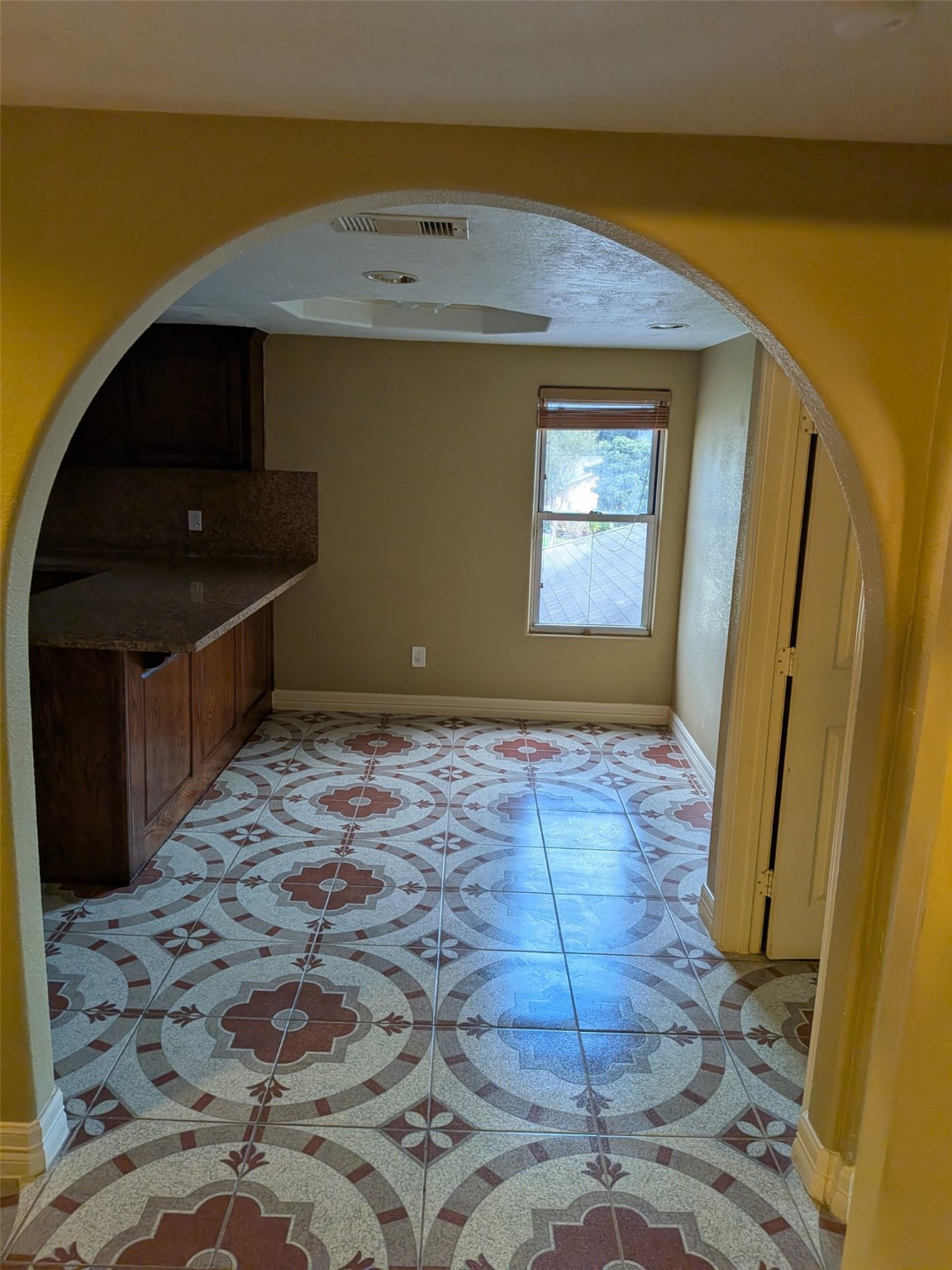 807 Ruth Street Baytown, TX 77520 - Photo 21 of 36 a view of empty room with wooden floor and fan