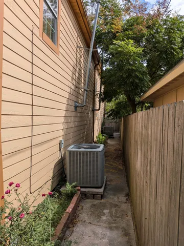 a view of a pathway with a white door