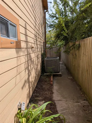 a backyard of a house with yard and outdoor seating