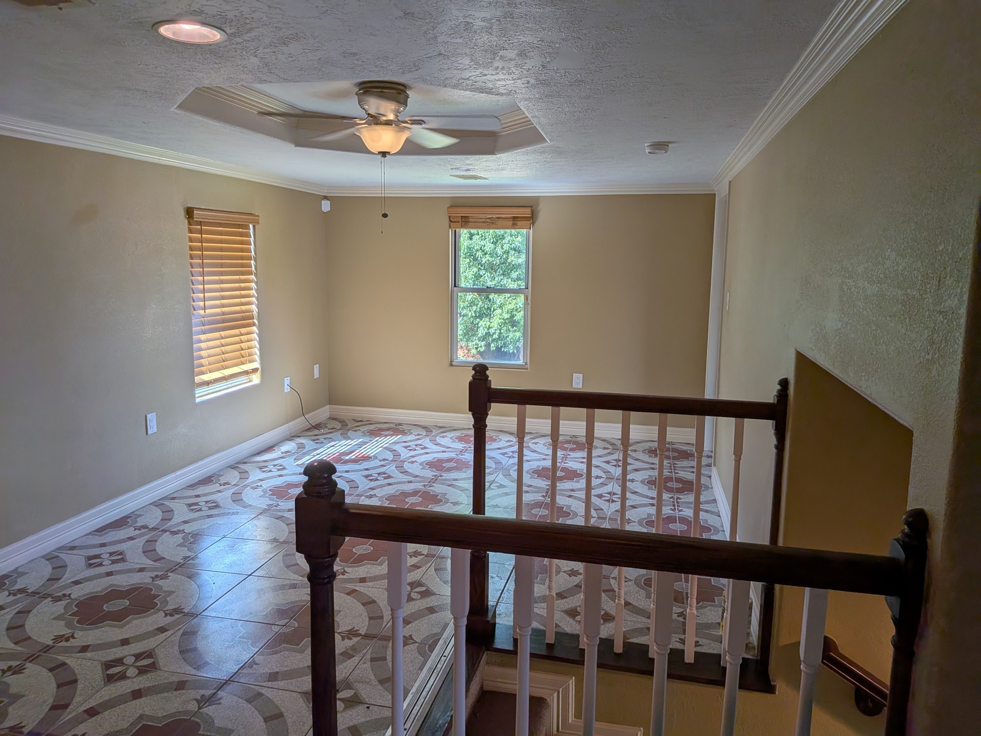 807 Ruth Street Baytown, TX 77520 - Photo 10 of 36 a view of a hallway with wooden floor and windows