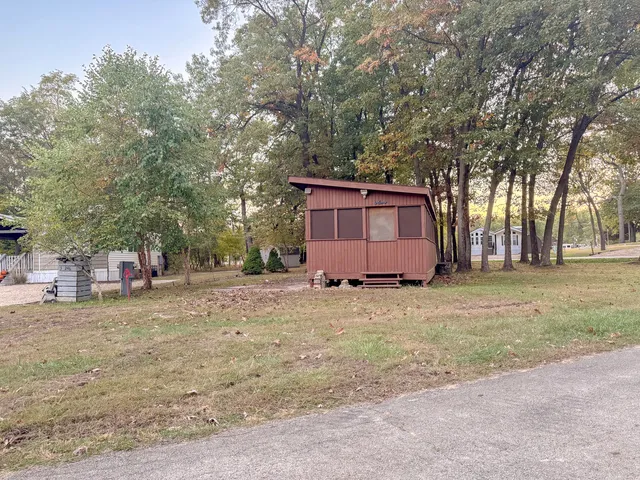 a house with trees in front of it