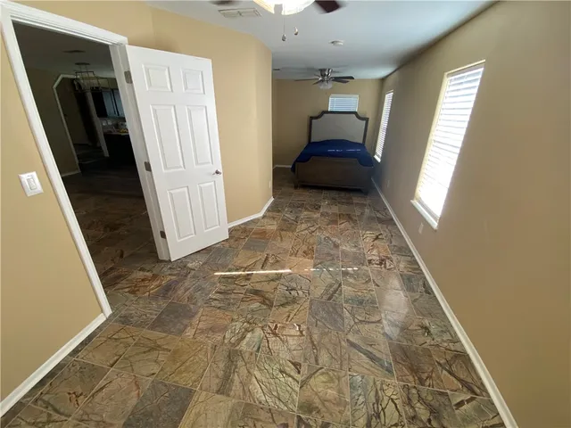 a bathroom with a toilet and a bathtub