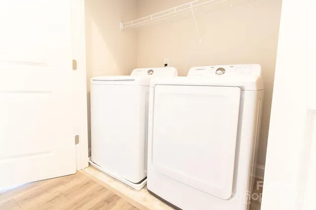 a utility room with dryer and washer