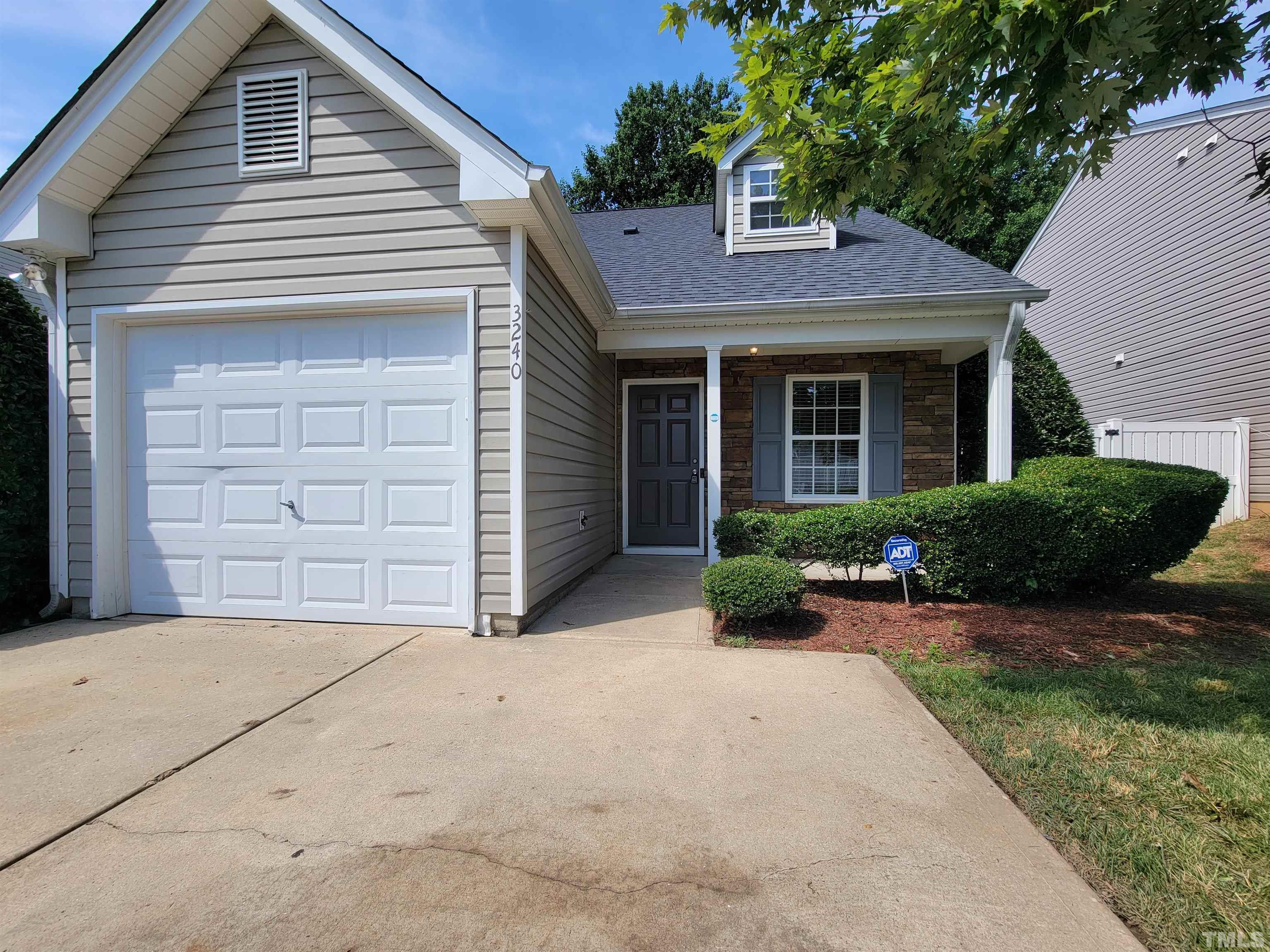 3240 Marcony Way Raleigh, NC 27610 - Photo 11 of 31 front view of a house with a yard