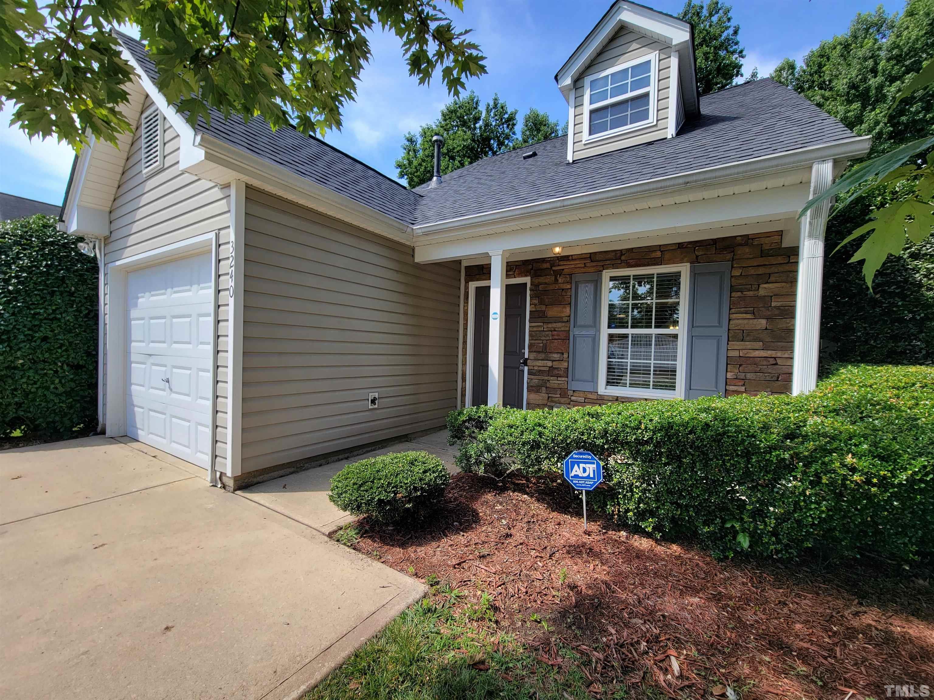 3240 Marcony Way Raleigh, NC 27610 - Photo 12 of 31 a front view of a house with plants