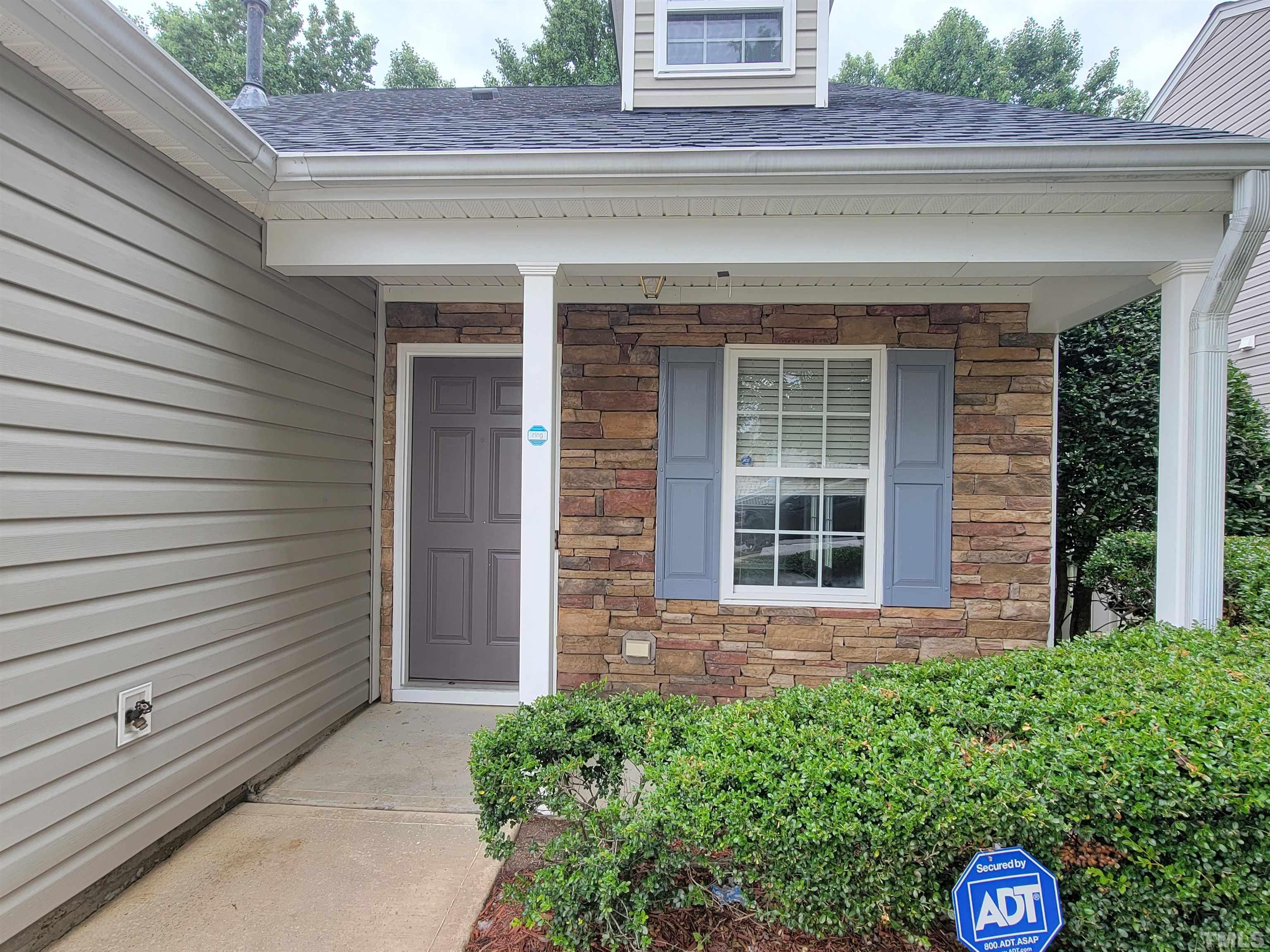 3240 Marcony Way Raleigh, NC 27610 - Photo 3 of 31 a front view of a house with a yard
