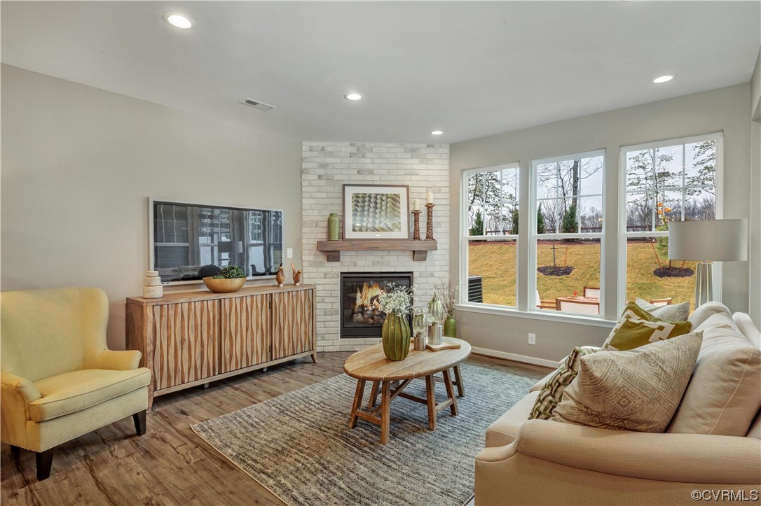 12830 Deep Wl Road Midlothian, VA 23112 - Photo 12 of 50 a living room with furniture and a fireplace