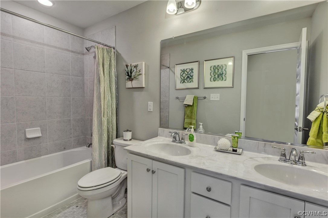 12830 Deep Wl Road Midlothian, VA 23112 - Photo 19 of 50 a bathroom with a granite countertop sink toilet and shower