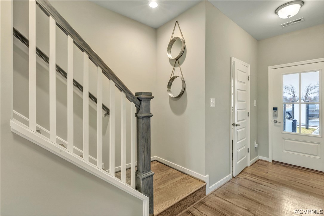 12830 Deep Wl Road Midlothian, VA 23112 - Photo 3 of 50 a view of an entryway with wooden floor