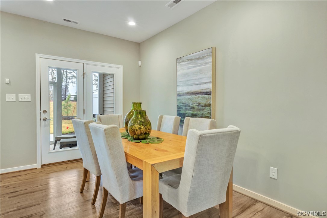 12830 Deep Wl Road Midlothian, VA 23112 - Photo 5 of 50 a view of a dining room with furniture window and wooden floor