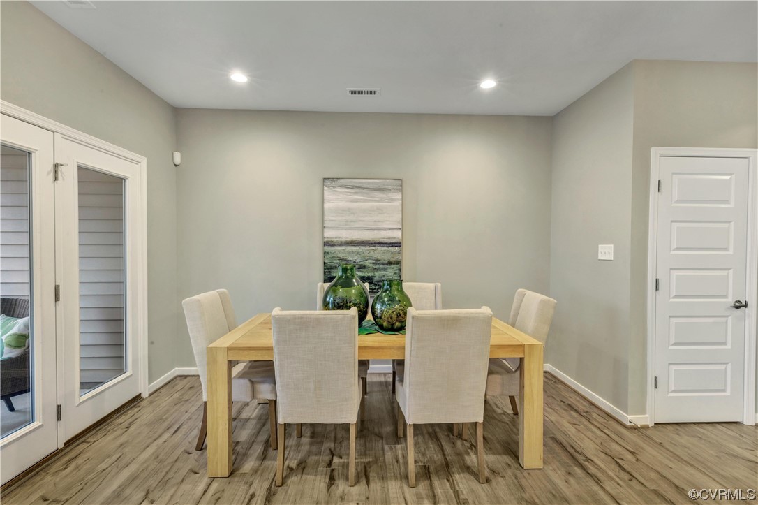 12830 Deep Wl Road Midlothian, VA 23112 - Photo 10 of 50 a view of a dining room with furniture window and wooden floor