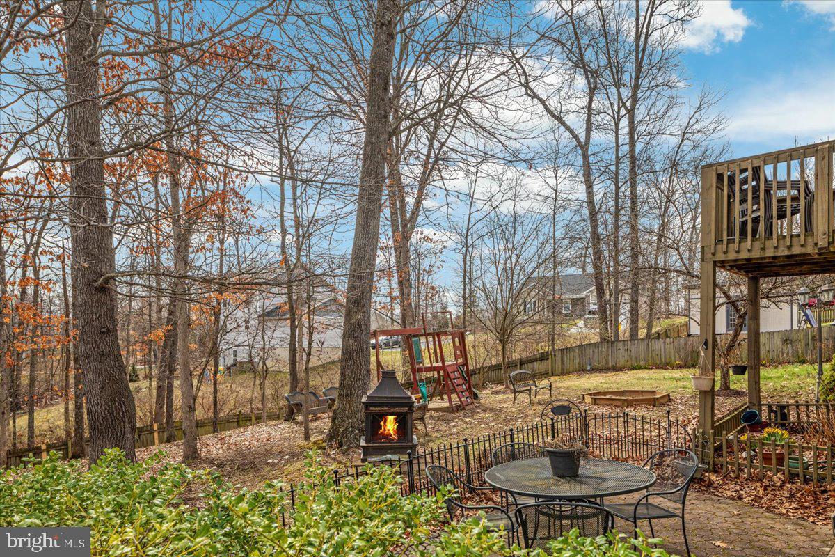 68 Raft Court Inwood, WV 25428 - Photo 27 of 32 Mature trees with fenced backyard