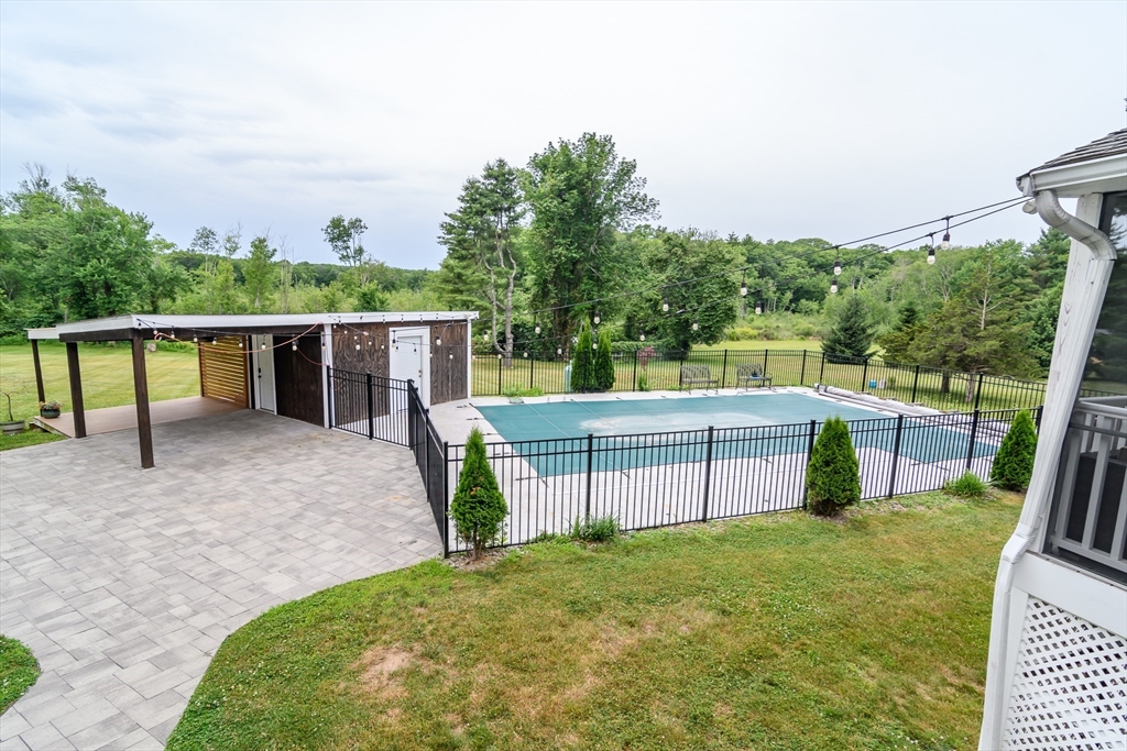 124 Everett Street Natick, MA 01760 - Photo 30 of 36 a view of a backyard with sitting area