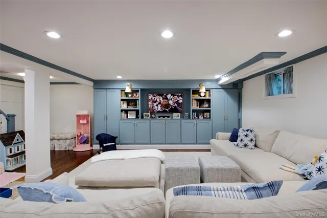 a bedroom with a large bed and a couch