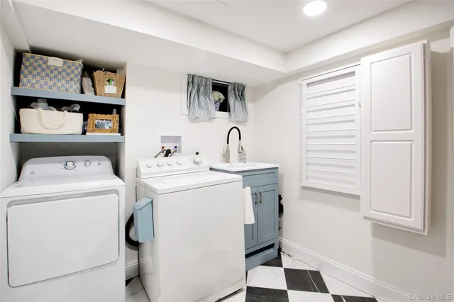 a utility room with dryer and washer