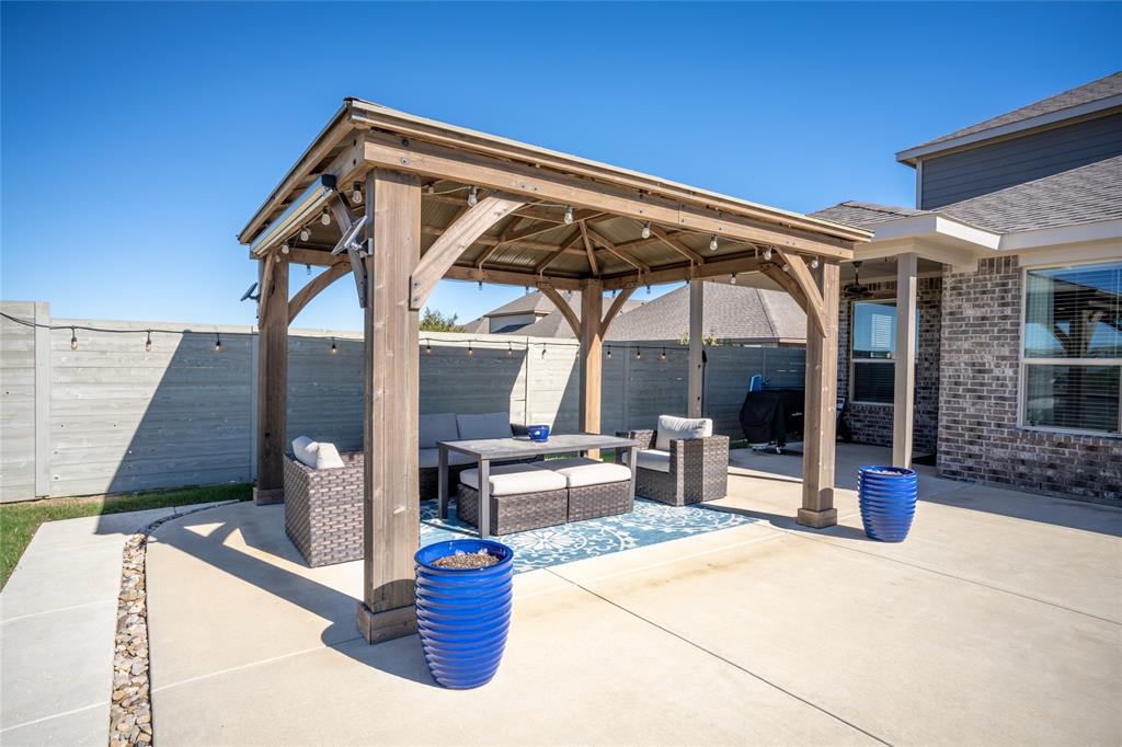 2404 Blackrail Court Argyle, TX 76226 - Photo 24 of 40 a view of sitting area with glass windows