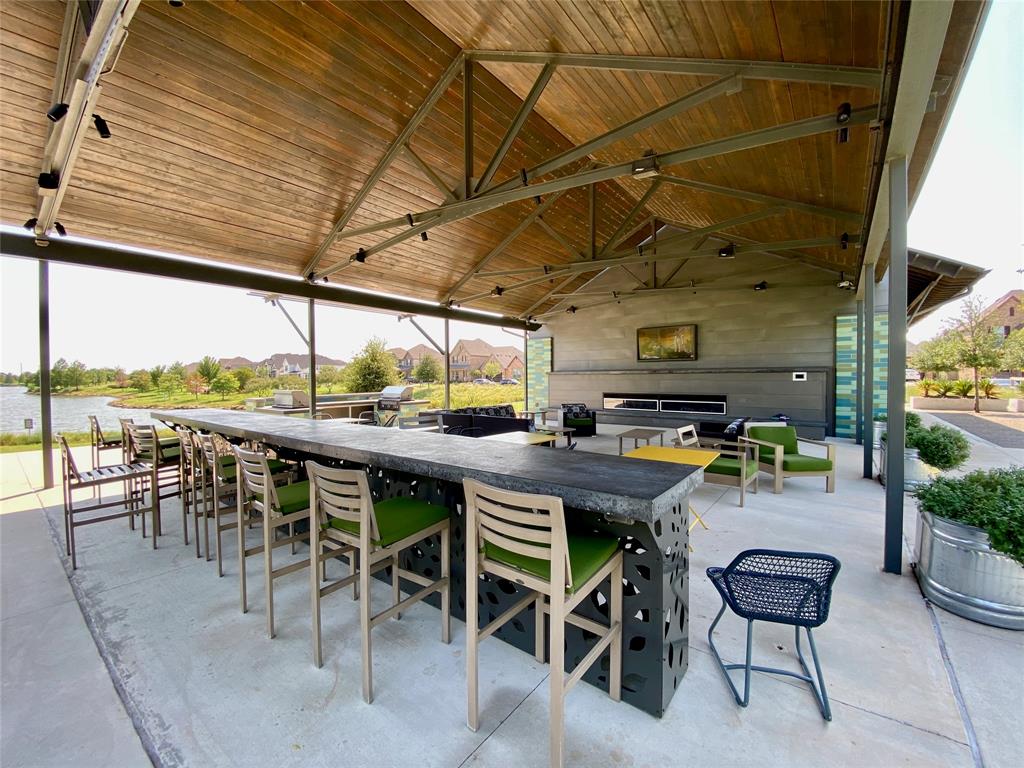 2404 Blackrail Court Argyle, TX 76226 - Photo 33 of 40 a view of a patio with a table and chairs