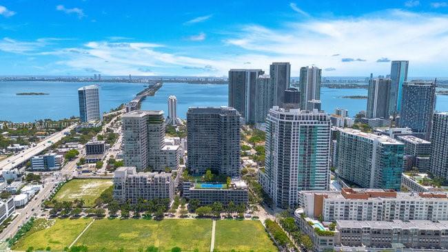 121 Northeast 34th Street, Unit L303 Miami, FL 33137 - Photo 2 of 31 a view of a city with tall buildings