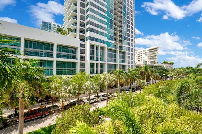 121 Northeast 34th Street, Unit L303 Miami, FL 33137 - Photo 3 of 31 a view of a building with a garden