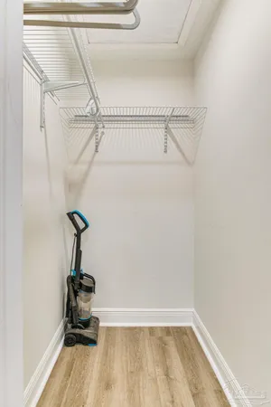 a view of a room with racks on the wall