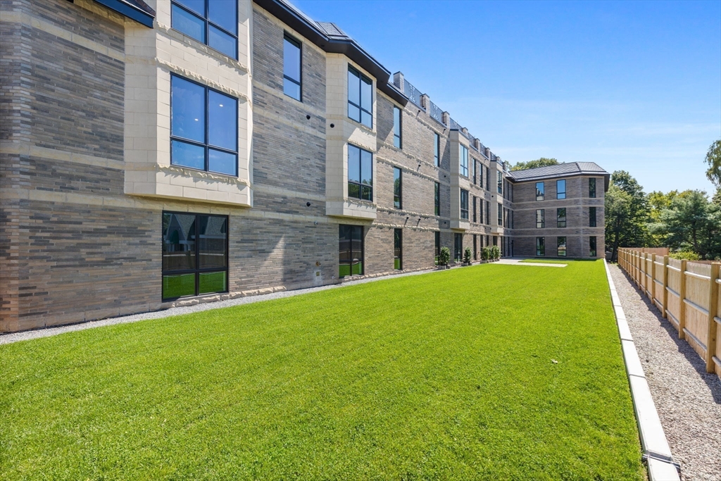 1114 Beacon Street, Unit 207 Newton, MA 02461 - Photo 27 of 29 a house view with a outdoor space