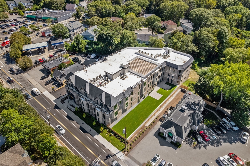 1114 Beacon Street, Unit 207 Newton, MA 02461 - Photo 29 of 29 an aerial view of a house with a garden