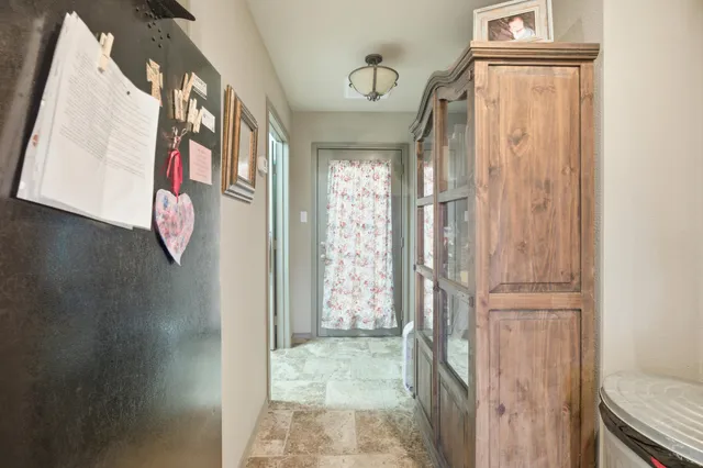 a bathroom with a toilet a sink and a mirror