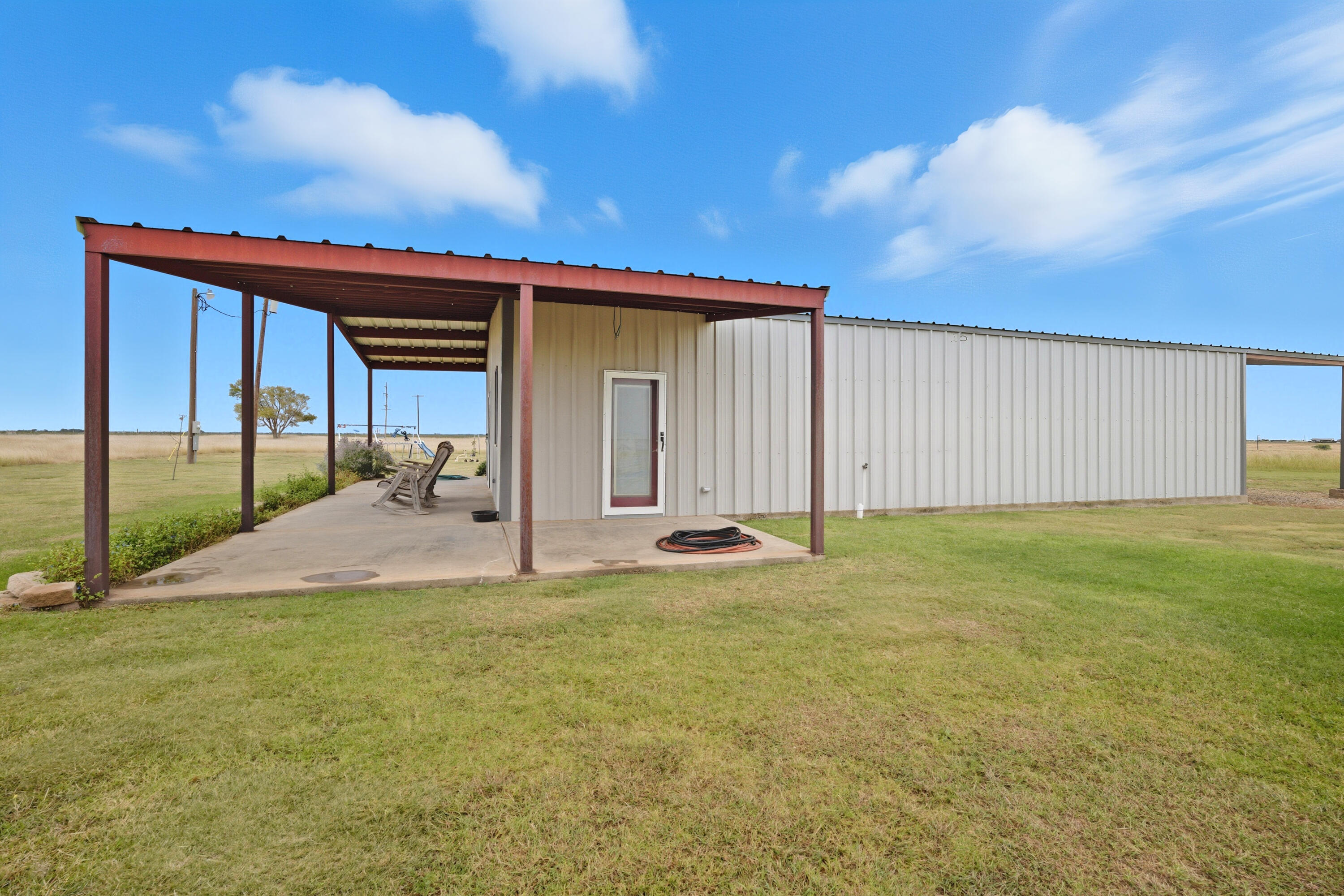 672 Cr M Road New Home, TX 79381 - Photo 4 of 30 a view of a backyard with garden